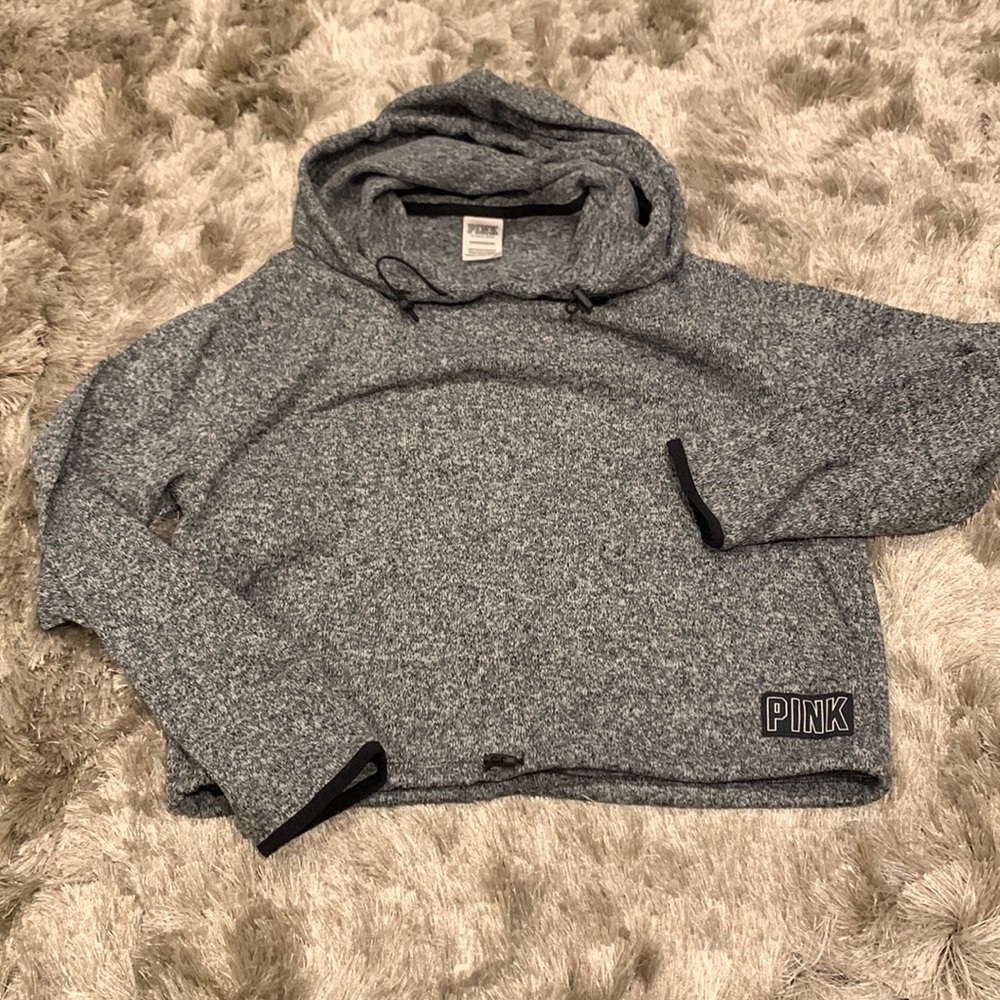 Pink cropped hoodie.